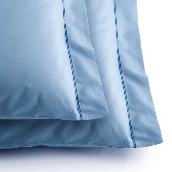 Two pillows in certified organic cotton sky color